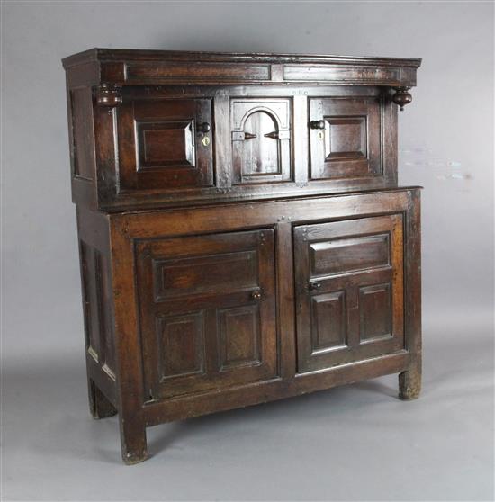 A mid 18th century oak diadarn, W.4ft 6in. D.1ft 9in. H.4ft 8in.